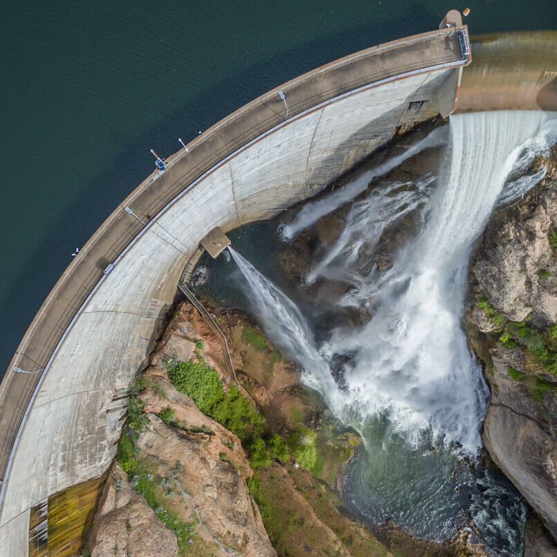 Water,Flowing,Over,A,Dam,As,Spring,Snowmelt,Fills,East